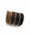Set of four silicone micro beads with different color options on a white background