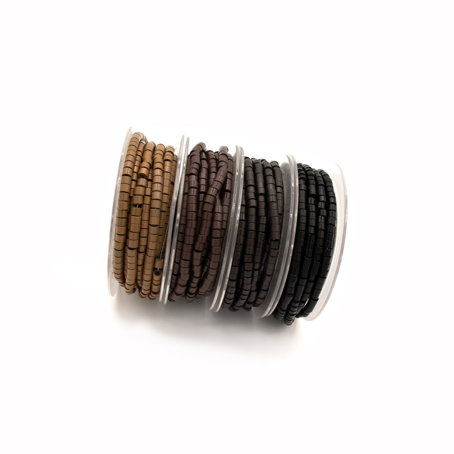 Set of four silicone micro beads with different color options on a white background
