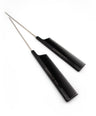 Two black hair styling metal tail combs on a white background