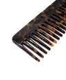 Tortoiseshell comb on a white background