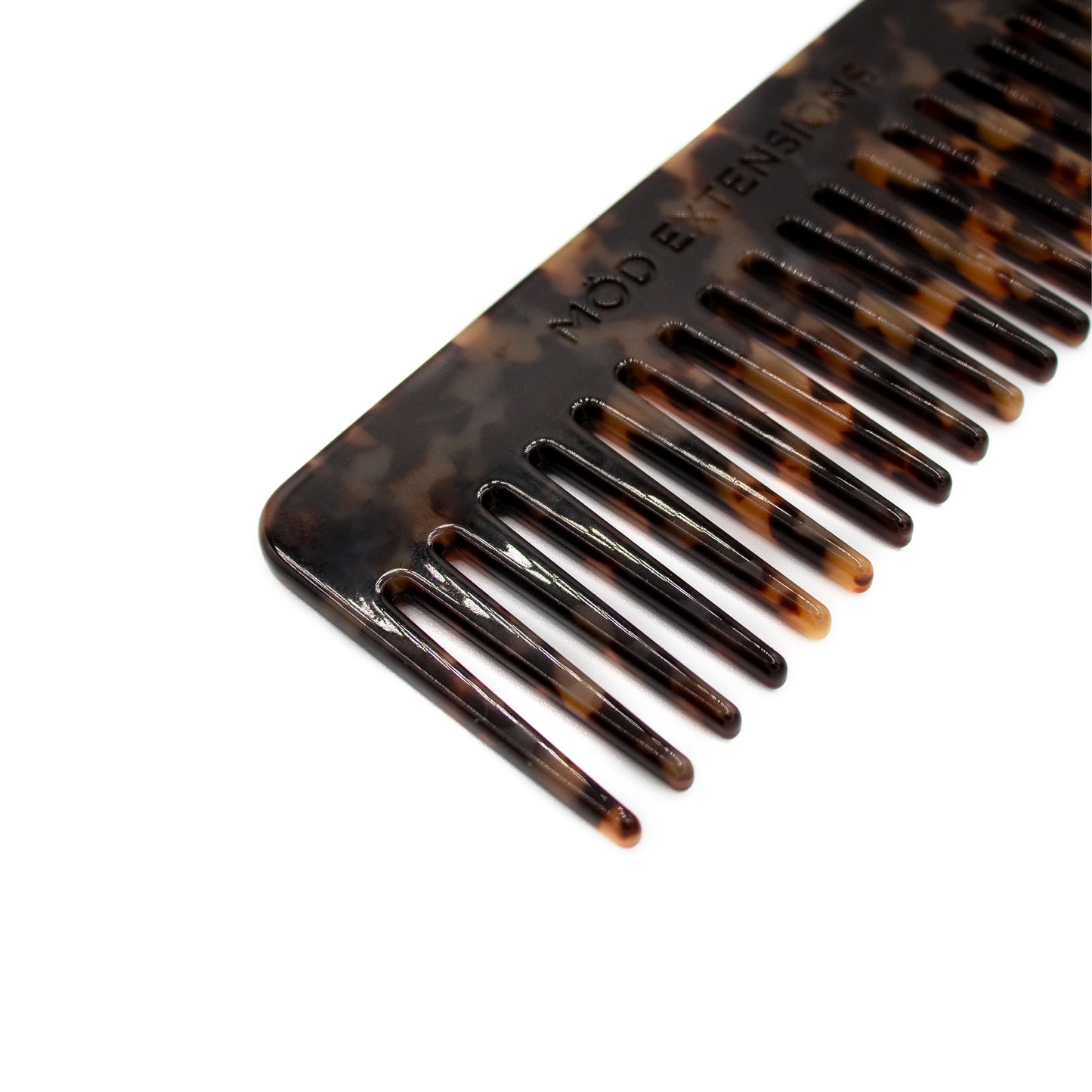 Tortoiseshell comb on a white background